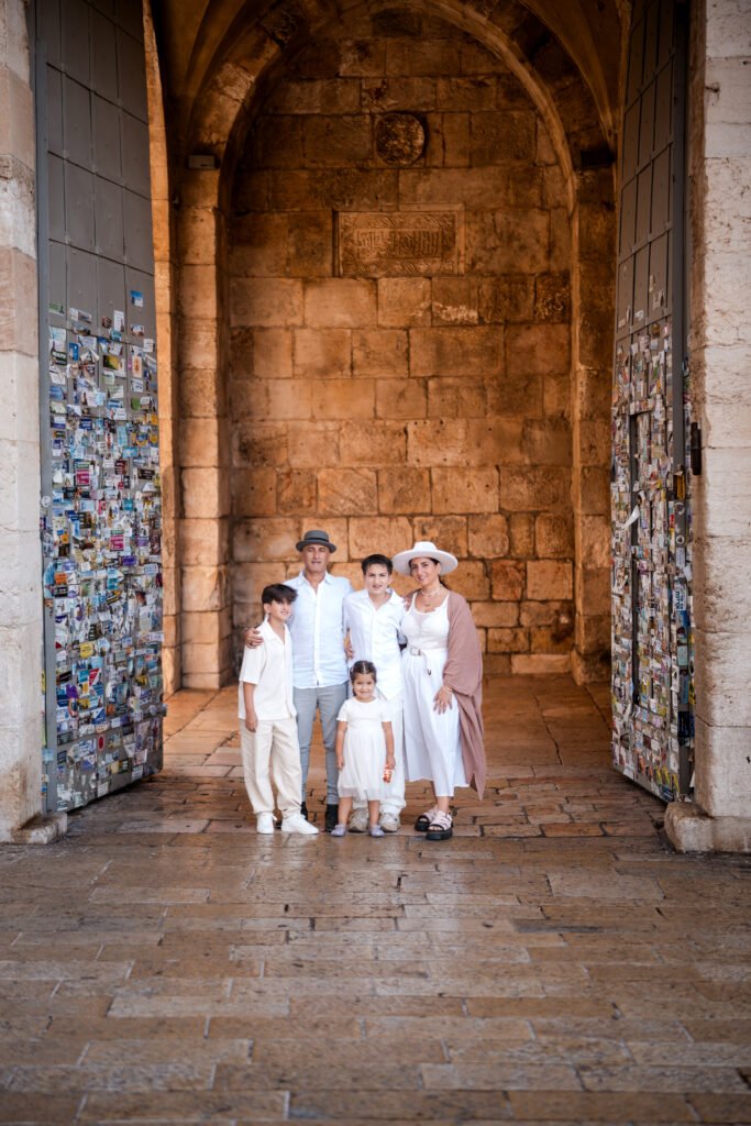 Family photo session at Jaffa Gate in Jerusalem’s Old City.